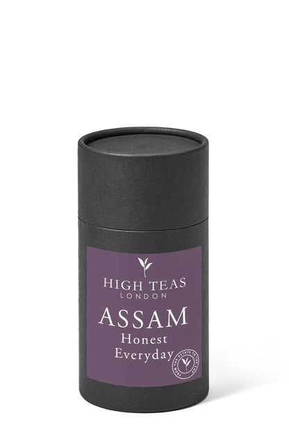 Loose leaf Honest Everyday Assam OP1 tea from High Teas, showing vibrant orange pekoe tea leaves in a clear container.