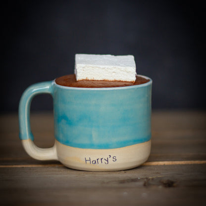 Large, fluffy Harry's Hot Chocolate marshmallows arranged in a cluster, showcasing their soft texture and white color.