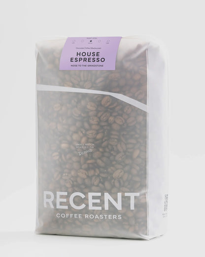 House blend medium roast coffee from Recent Beans, 1kg bag, featuring freshly ground coffee beans for brewing.