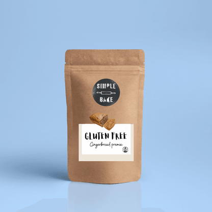 Gluten-free oat gingerbread premix by Simple Bake, showing the finely blended dry gingerbread baking mix in a clear bowl.