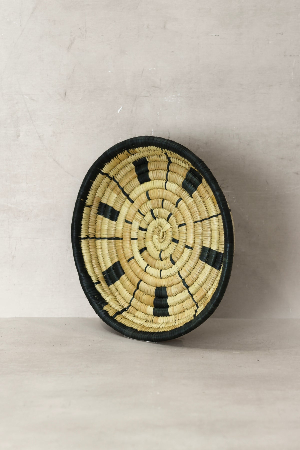 Small Malawi Wall Basket No 10 by Botanical Boys, vibrant woven wall art with intricate patterns, perfect for wall decor.