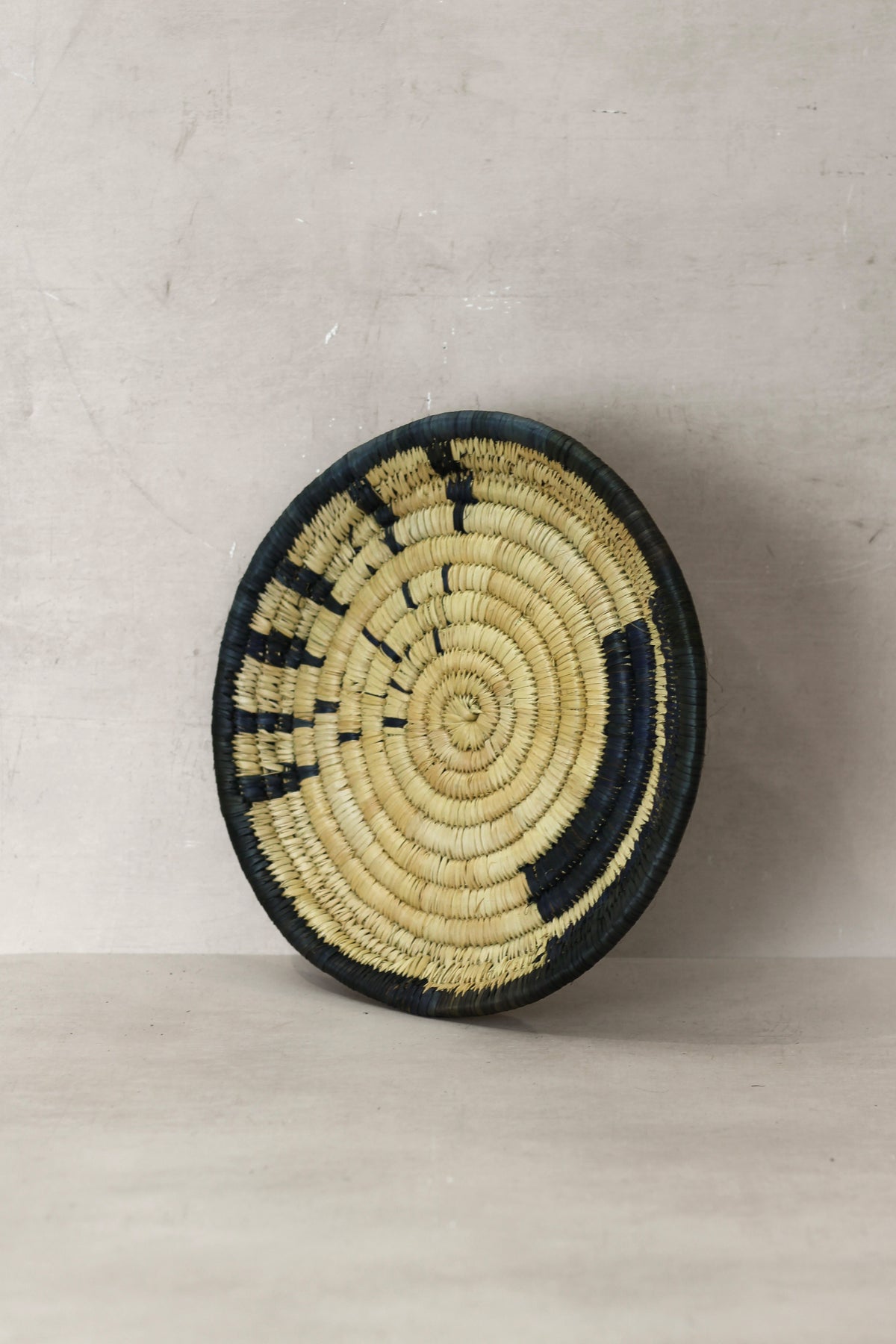 Small Malawi Wall Basket No 11 by Botanical Boys, handcrafted wall art with woven natural fibers for home decor.
