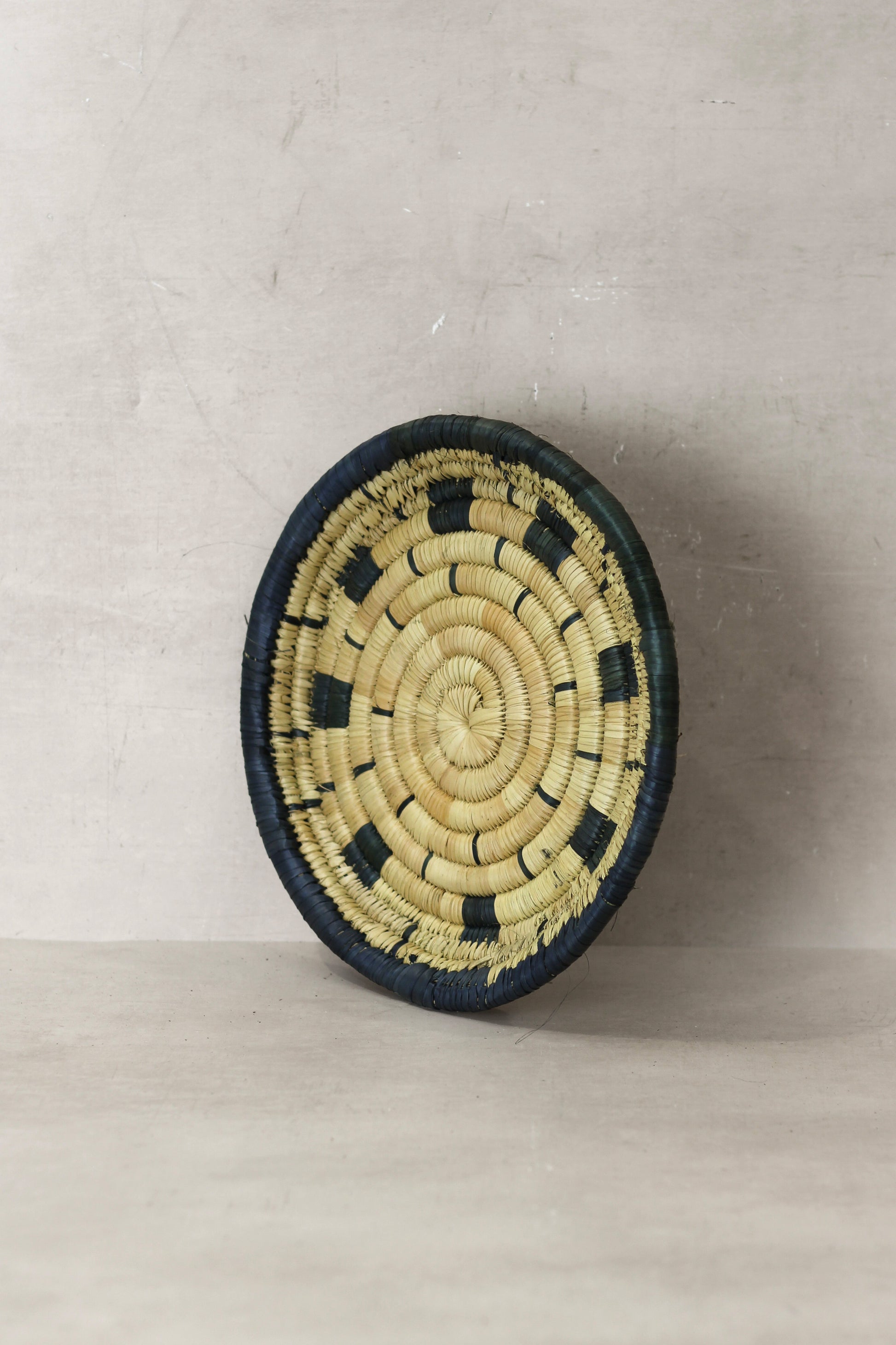 Small Malawi Wall Basket No 12 by Botanical Boys, a decorative woven wall art piece showcasing natural textures and craftsmanship.