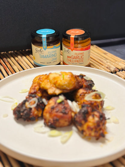 RoniBs Kitchen Filipino garlic chilli paste hot sauce with Scotch Bonnets, medium heat, vegan, showing a jar of spicy sauce.