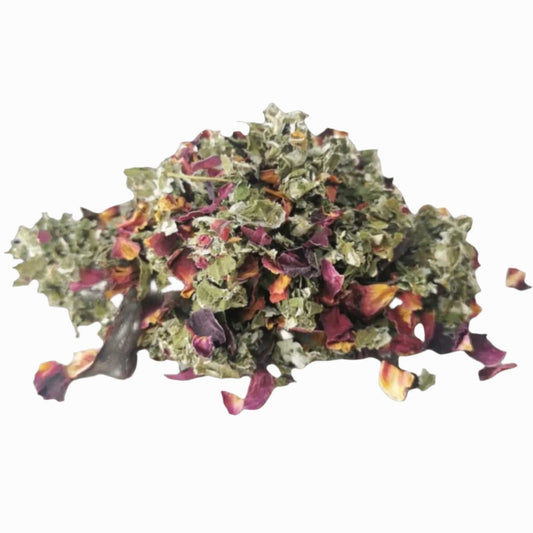 Porter Hill Tea Company Rubus et al. fruit and herbal tea blend in a glass teacup with fresh berries and herbs.