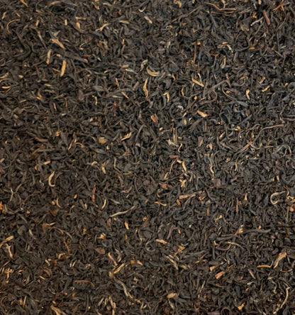 Assam Mangalam FTGFOP1 tea leaves from High Teas, showcasing fresh, whole dried tea leaves in a close-up shot.