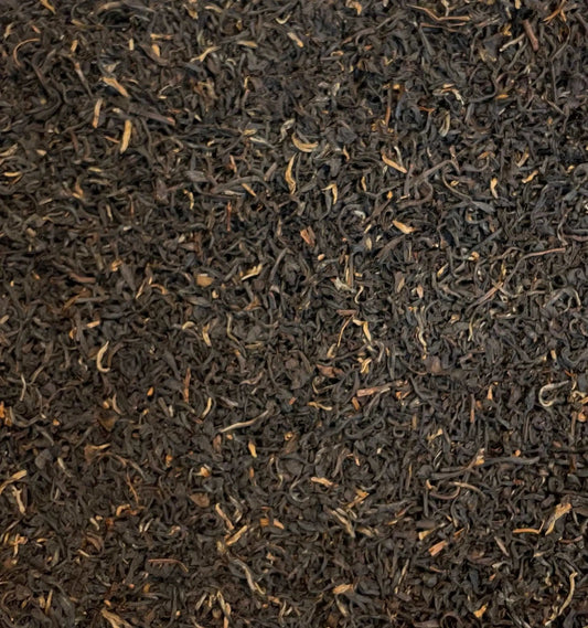 Assam Mangalam FTGFOP1 tea leaves from High Teas, showcasing fresh, whole dried tea leaves in a close-up shot.