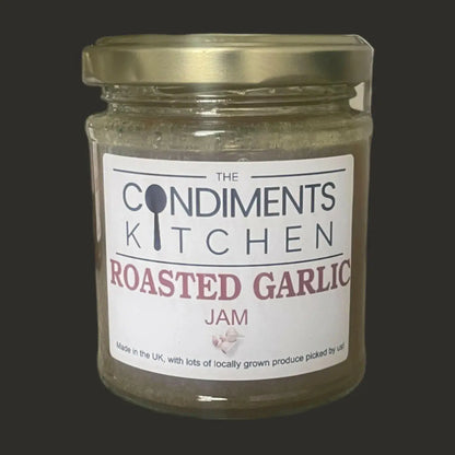 Roasted garlic jam chutney from The Condiments Kitchen in a 195g jar, showing the rich, dark caramelized garlic spread.