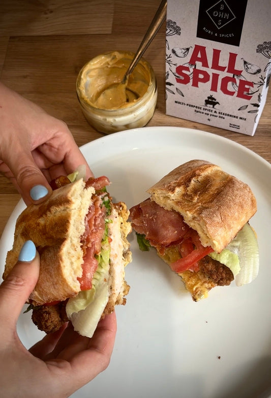 Book titled "All Spice" by BOHNS Rubs featuring multi-purpose seasoning mix with colorful spice illustrations on the cover
