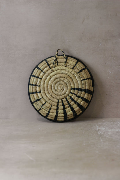 Small Malawi Wall Basket No 2 by Botanical Boys, natural woven basket with a round shape, decorative wall hanging.