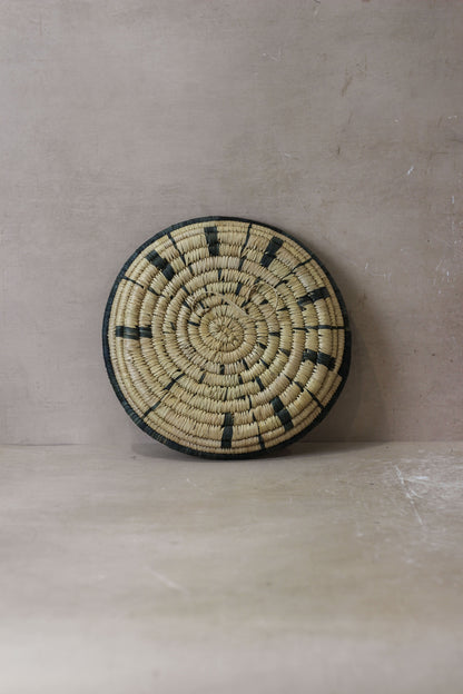 Small Malawi Wall Basket No 3 by Botanical Boys, handcrafted wall art with woven design, perfect for home decor.