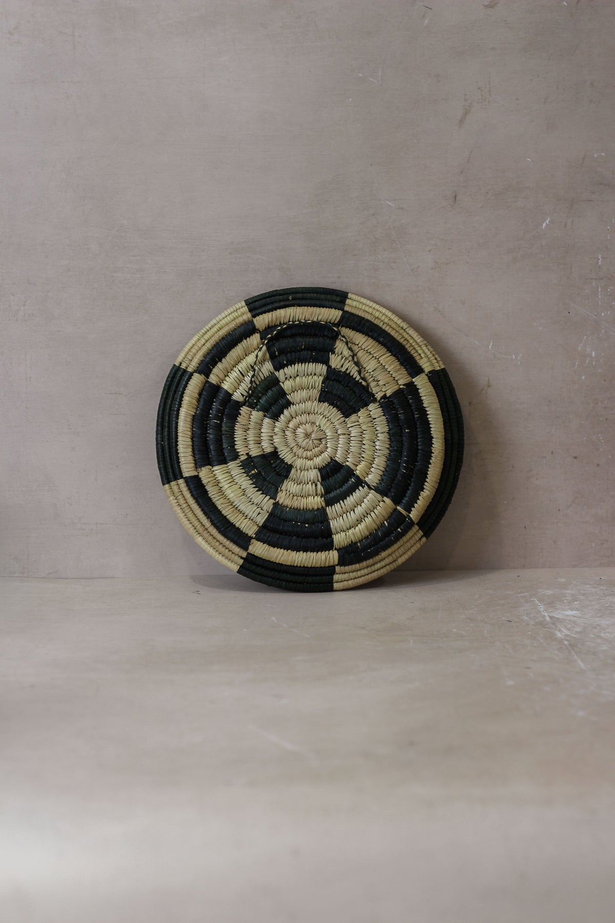 Small Malawi Wall Basket No 4 by Botanical Boys, woven wall art with intricate natural fibers, showcasing detailed craftsmanship.