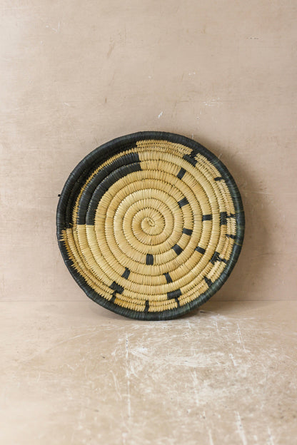 Small Malawi Wall Basket No 5 by Botanical Boys, a handcrafted wall art piece with woven natural fibers and intricate design.