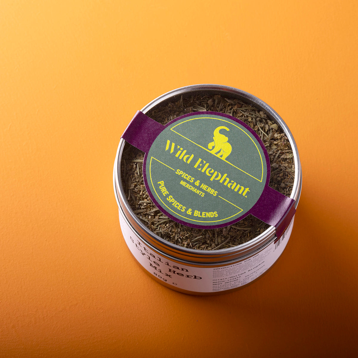 Organic Italian style herb mix from Wild Elephant, featuring fresh herbs and spices in an 80g package, ideal for seasoning dishes.