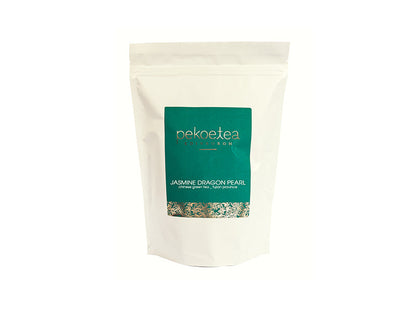 PekoeTea Edinburgh Jasmine Dragon Pearl green tea in 250g tin, showing delicate pearl-shaped tea leaves with jasmine blossoms