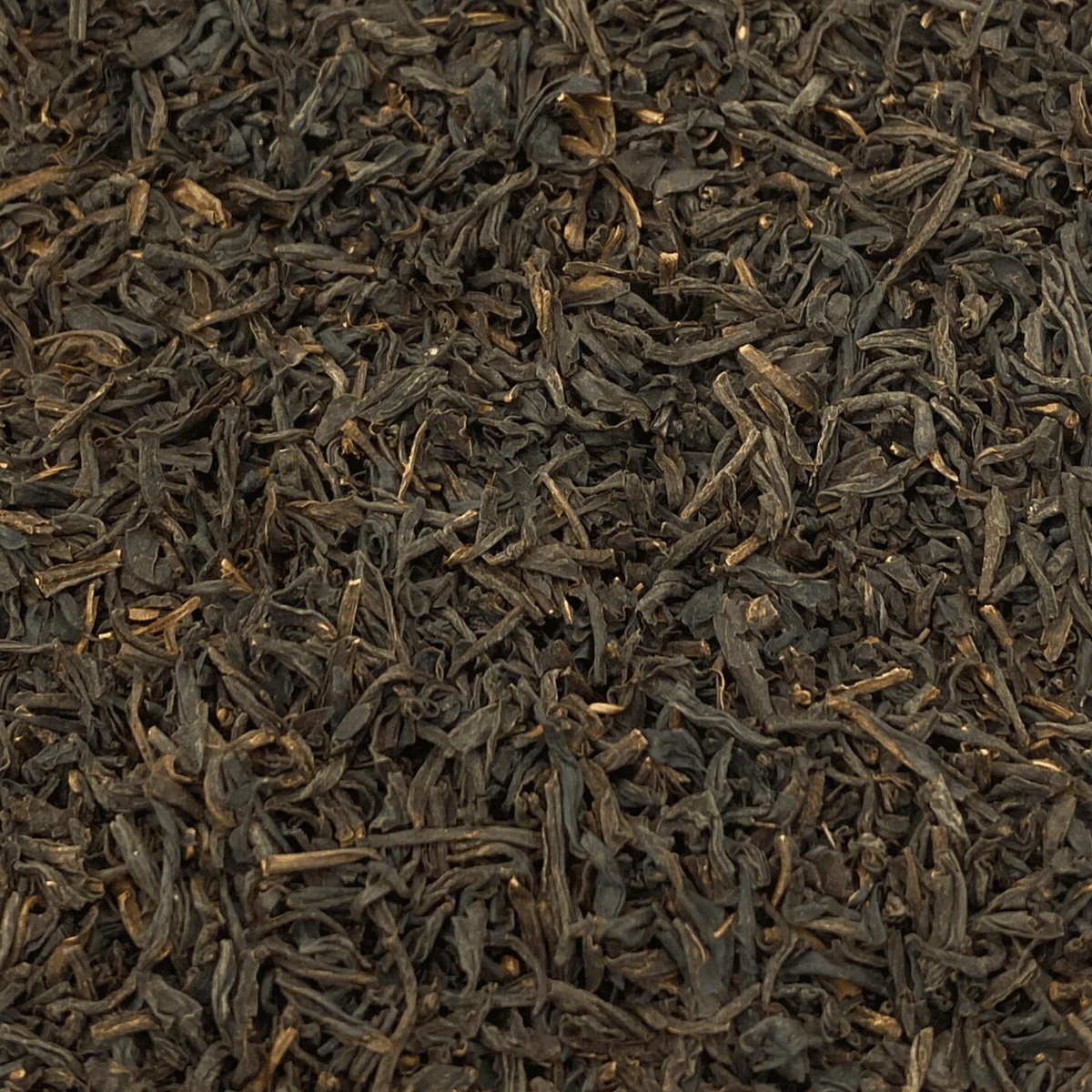 Organic Keemun Panda black tea from Porter Hill Tea Company, showing dried tea leaves and packaging.