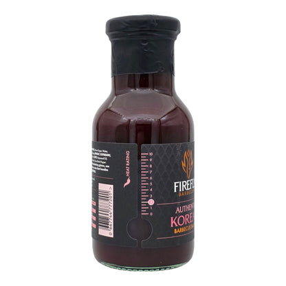 Bottle of FireFly Barbecue Korean BBQ Sauce with a dark, savory appearance, perfect for grilling and marinades.