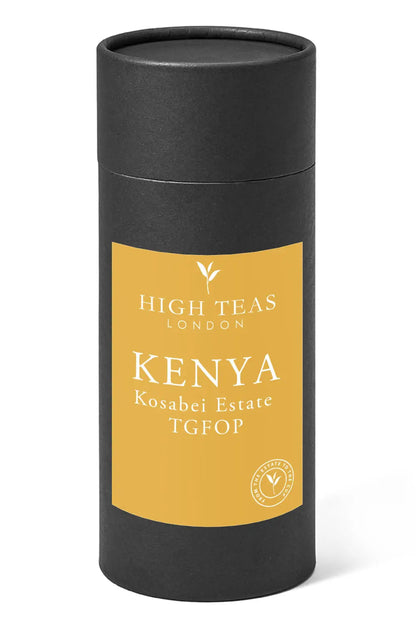 Loose leaf Kenya Kosabei Estate TGFOP tea by High Teas, showing fresh, dark tea leaves in a natural setting.