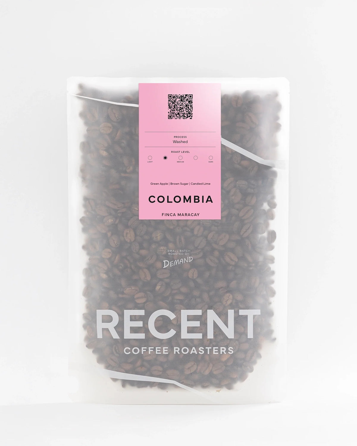 Colombia Finca Maracay Medium Roast Coffee bag from Recent Beans, with vibrant pink packaging and detailed product label.