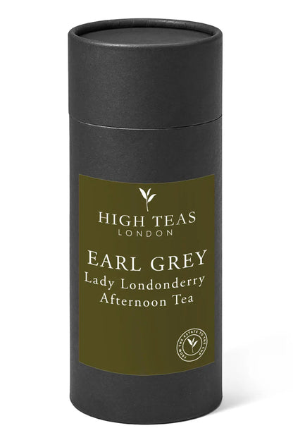 Loose leaf Lady Londonderry Afternoon Tea House Blend by High Teas, displayed in a teapot with tea leaves and a cup.