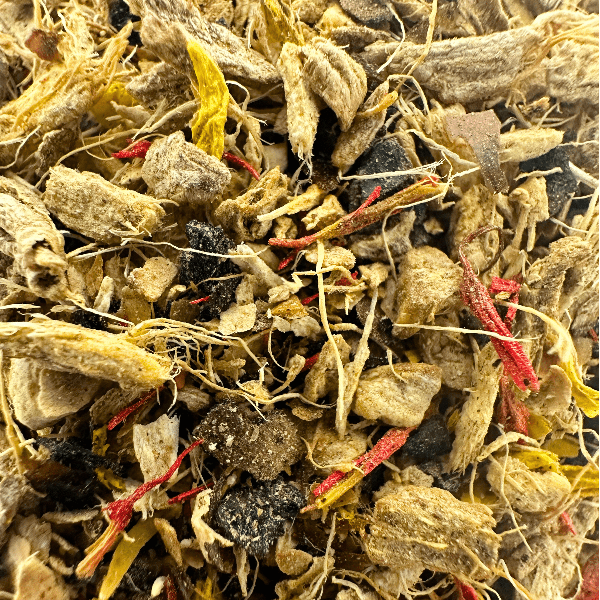Loose leaf Lemon & Ginger Fruit & Herbal Tea from Porter Hill Tea Company, showing fresh lemon and ginger pieces in the tea blend.