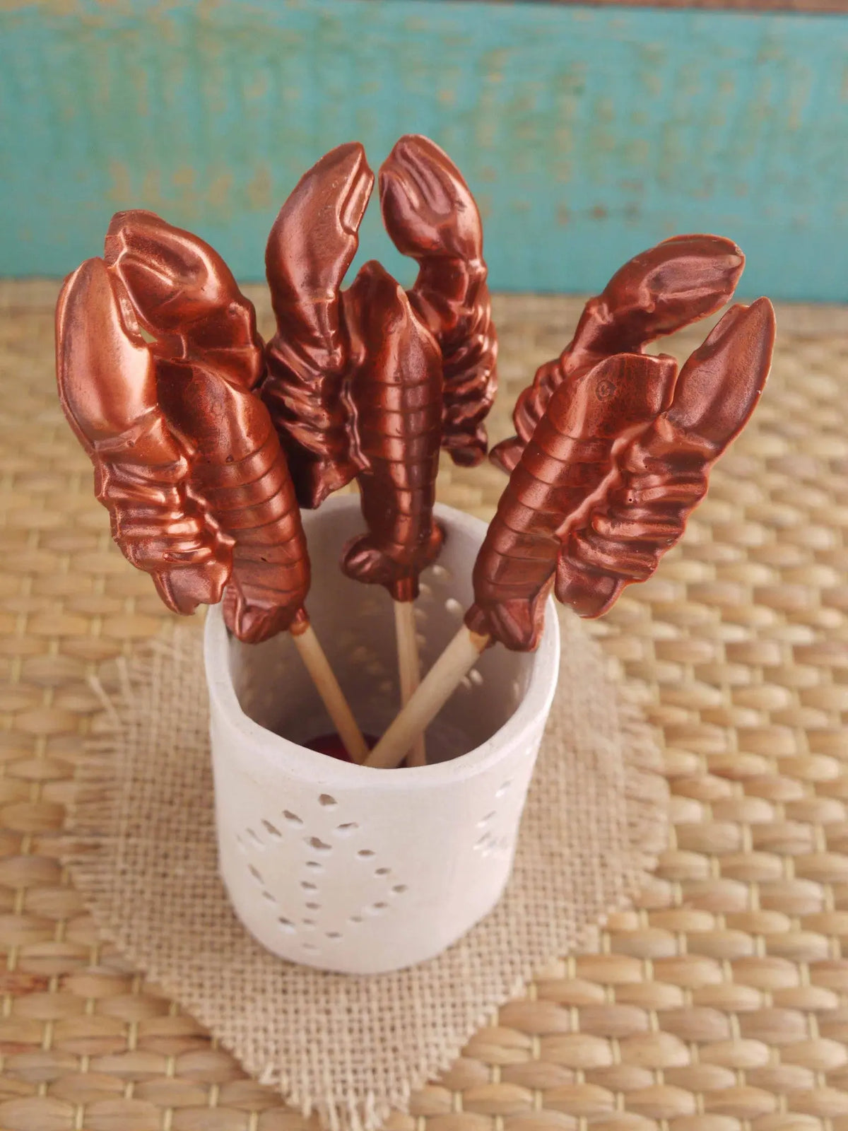 Bright red lobster-shaped lollipop from Gorvett & Stone with detailed claws and tail, perfect for candy treats and novelty gifts.
