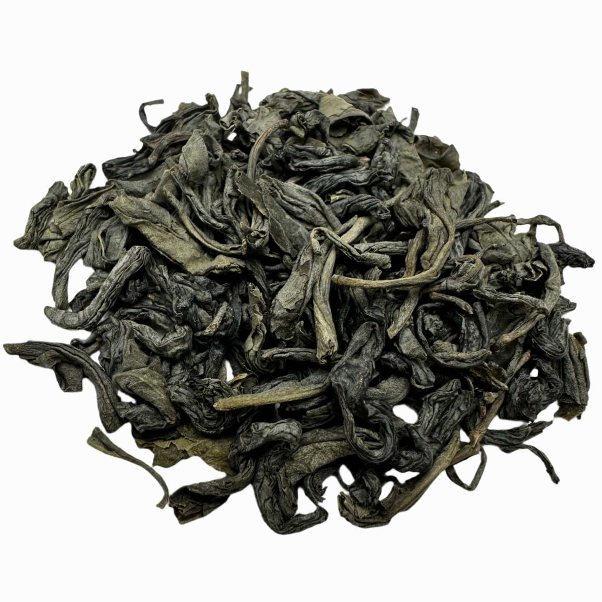 Loose leaf Lucky Dragon Hyson green tea from Porter Hill Tea Company, showing vibrant green tea leaves in a clear container.