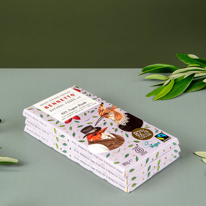 Bennetto Natural Foods UK 82% super dark chocolate bar with rich, smooth dark chocolate pieces on a rustic wooden surface.