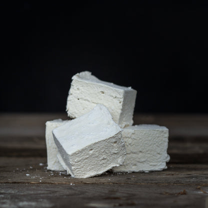 Harry's Hot Chocolate giant marshmallows on a plate, soft and fluffy with a white, pillowy appearance, perfect for hot chocolate.