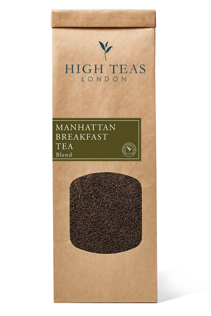 Loose leaf Manhattan Breakfast Tea by High Teas in a clear glass jar with a metal lid, showcasing dark tea leaves.