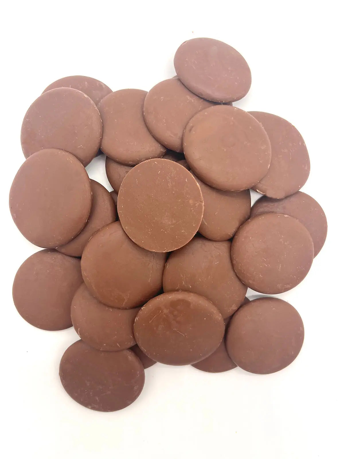 Milk chocolate couverture buttons from Gorvett & Stone, 1kg bag, showing smooth, round chocolate buttons suitable for baking and confectionery.