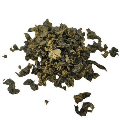 Loose leaf Quanzhou Milk Oolong tea by Porter Hill Tea Company, showcasing creamy, rolled tea leaves with a rich aroma.