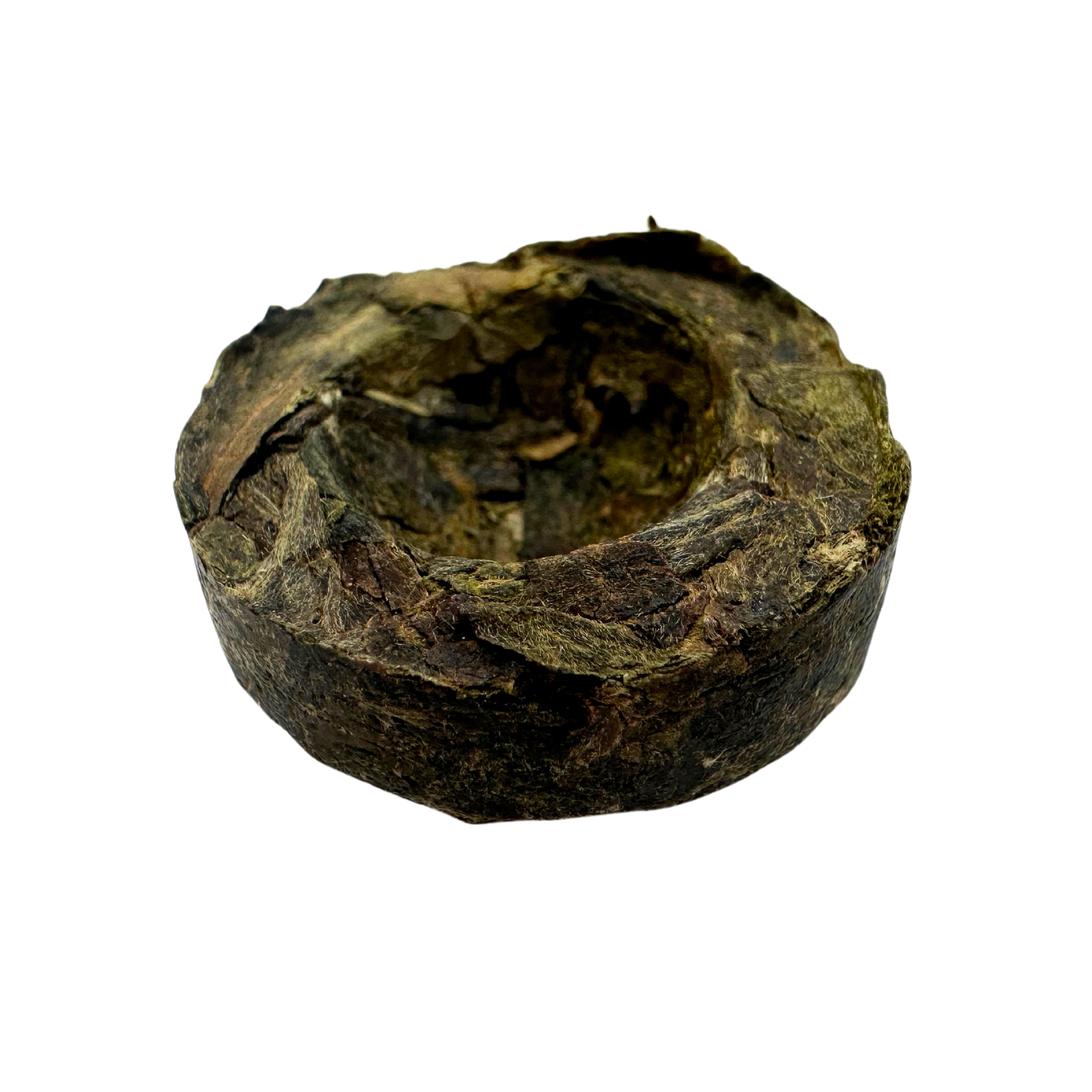 Mini Pu-erh Black Tea Toucha from Porter Hill Tea Company, showing a small compressed tea cake for brewing.