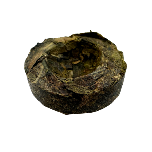 Mini Pu-erh Black Tea Toucha from Porter Hill Tea Company, showing a small compressed tea cake for brewing.