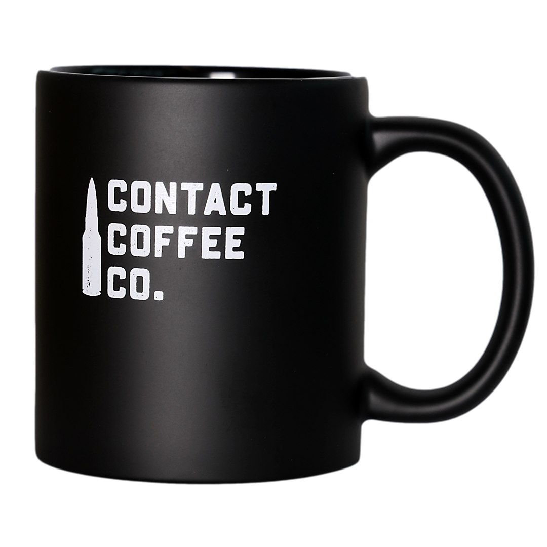 Contact Coffee Co Mug Alpha, a ceramic gear-shaped coffee mug with the Contact Coffee Company Ltd. logo and design visible.
