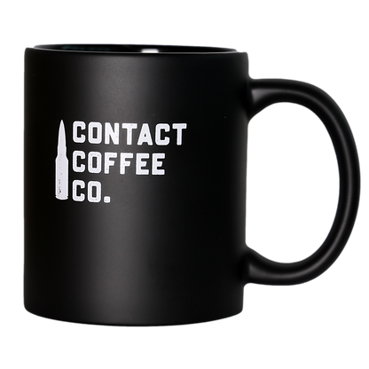 Contact Coffee Co mug from the Sortie Bundle, featuring a stylish gear design in a ceramic coffee mug.