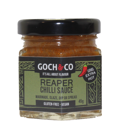 Goch & Co Reaper Chilli Sauce bottle with fiery red sauce and label, ready for spicy dishes and cooking enhancements.