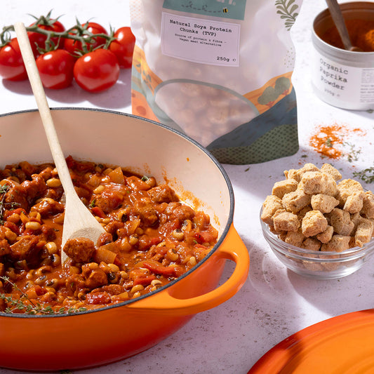Whole Food Earth TVP natural soy protein chunks in a bowl, showcasing their textured, protein-rich appearance for plant-based cooking.