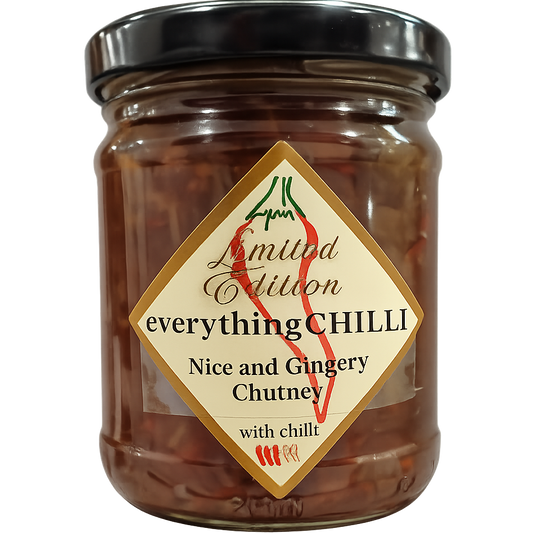 A glass jar of 'Nice and Gingery'chutney with a black lid and a diamond-shaped cream label. Looks delicious, yum yum!