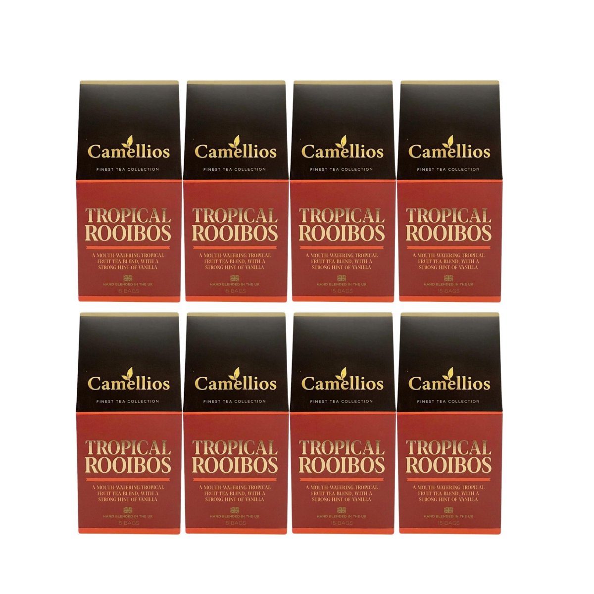 A cup of brewed Camellios Tropical Rooibos tea with vibrant tea infusions and fresh tropical fruits on a wooden table.