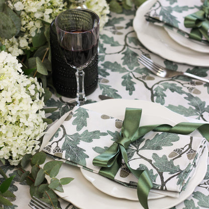 English Oak Tablecloth by Avalon Home UK draped over a wooden dining table, showcasing its natural oak pattern and elegant design.