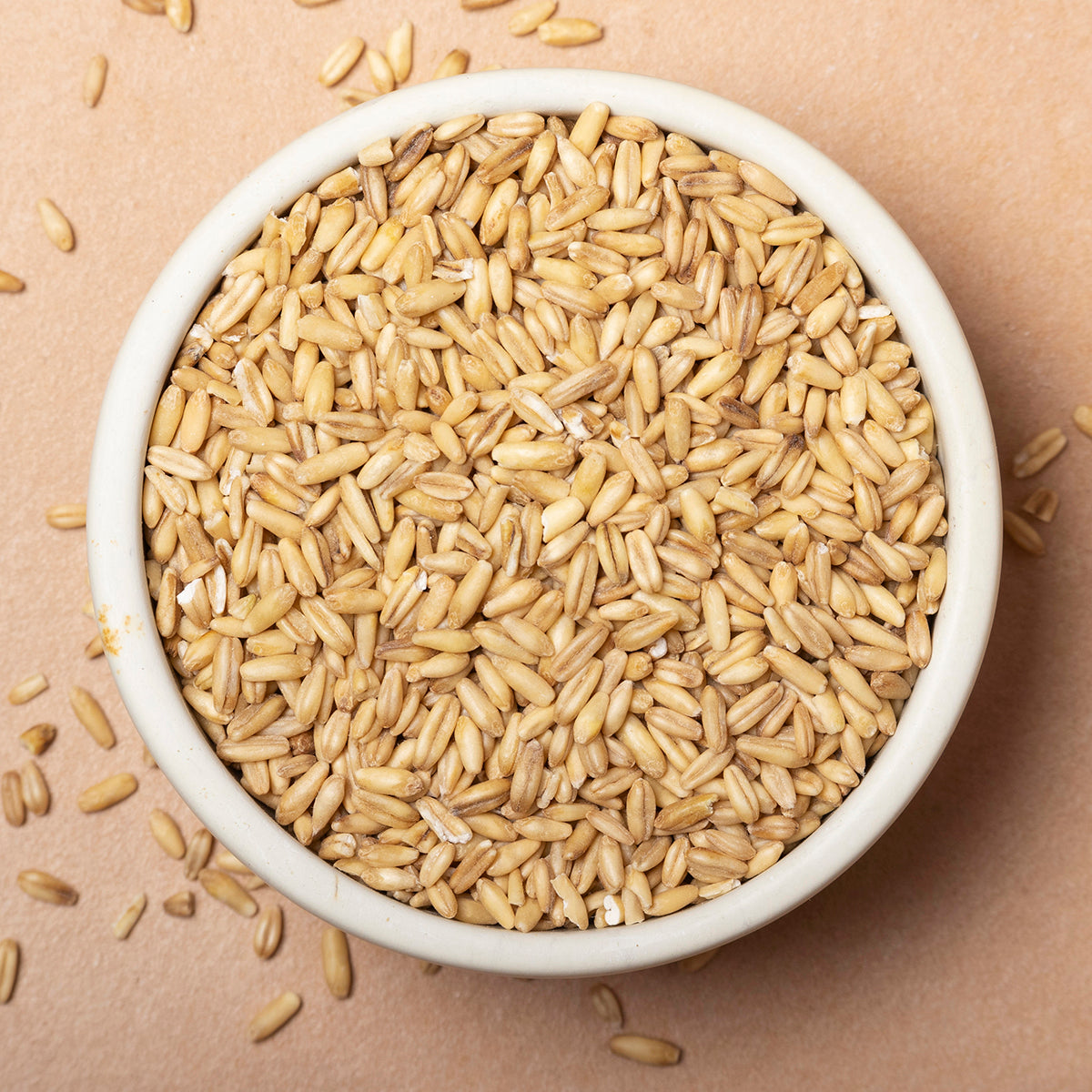 Whole Food Earth oat groats, large and whole grains of oats, shown in a close-up image.