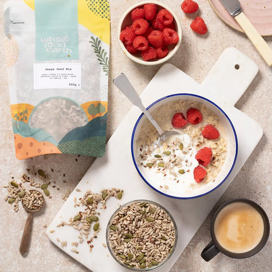 Mixed omega seed blend from Whole Food Earth with a variety of nutritious seeds in a natural setting.
