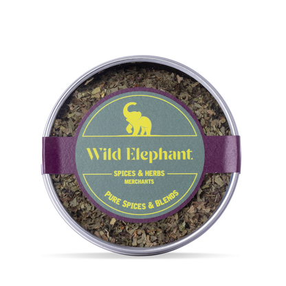 Organic dried basil from Wild Elephant, 75g, fresh herbs and spices, in a clear package with basil leaves visible inside.