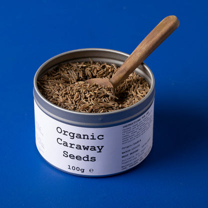Organic caraway seeds from Whole Food Earth, wild-harvested herbs and spices, shown in a 100g package.