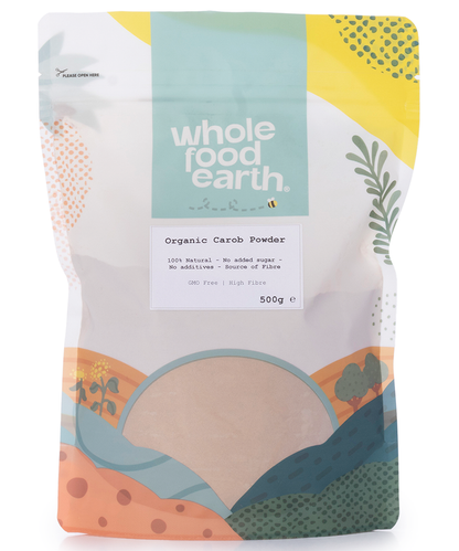 Organic carob powder in a 500g package from Whole Food Earth, showcasing a close-up of the brown, fine powder in a container.