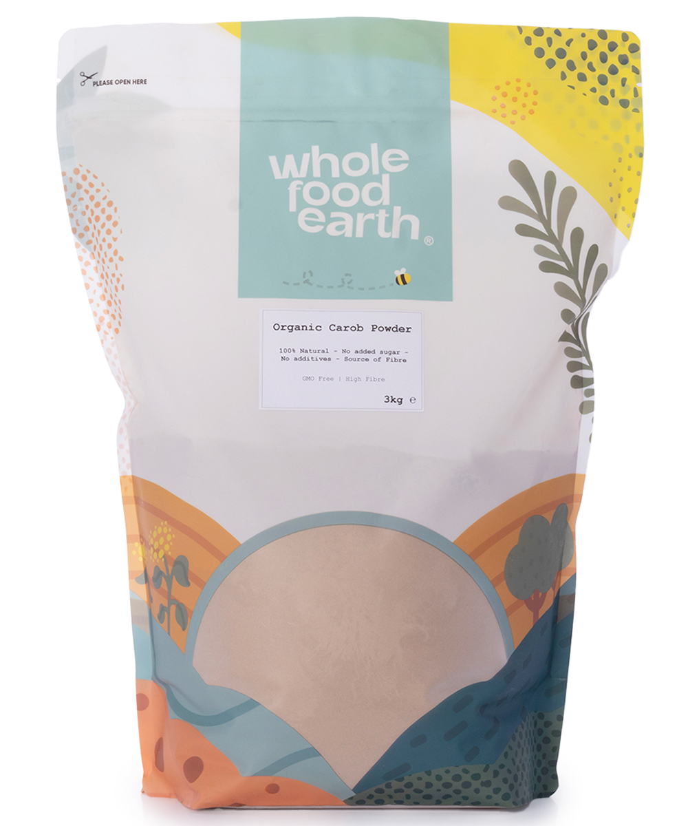 Organic carob powder from Whole Food Earth in a 3kg bag, showing the fine, dark brown powder in a natural setting.