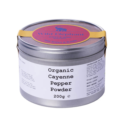 Organic Cayenne Pepper Powder from Wild Elephant, a vibrant red spice in a clear jar, part of Whole Food Earth's herbs and spices.