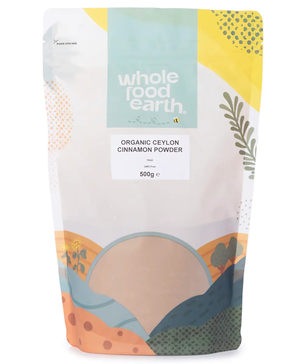 Organic Ceylon cinnamon powder from Whole Food Earth, finely ground herbal spice in a 500g container, natural and aromatic.