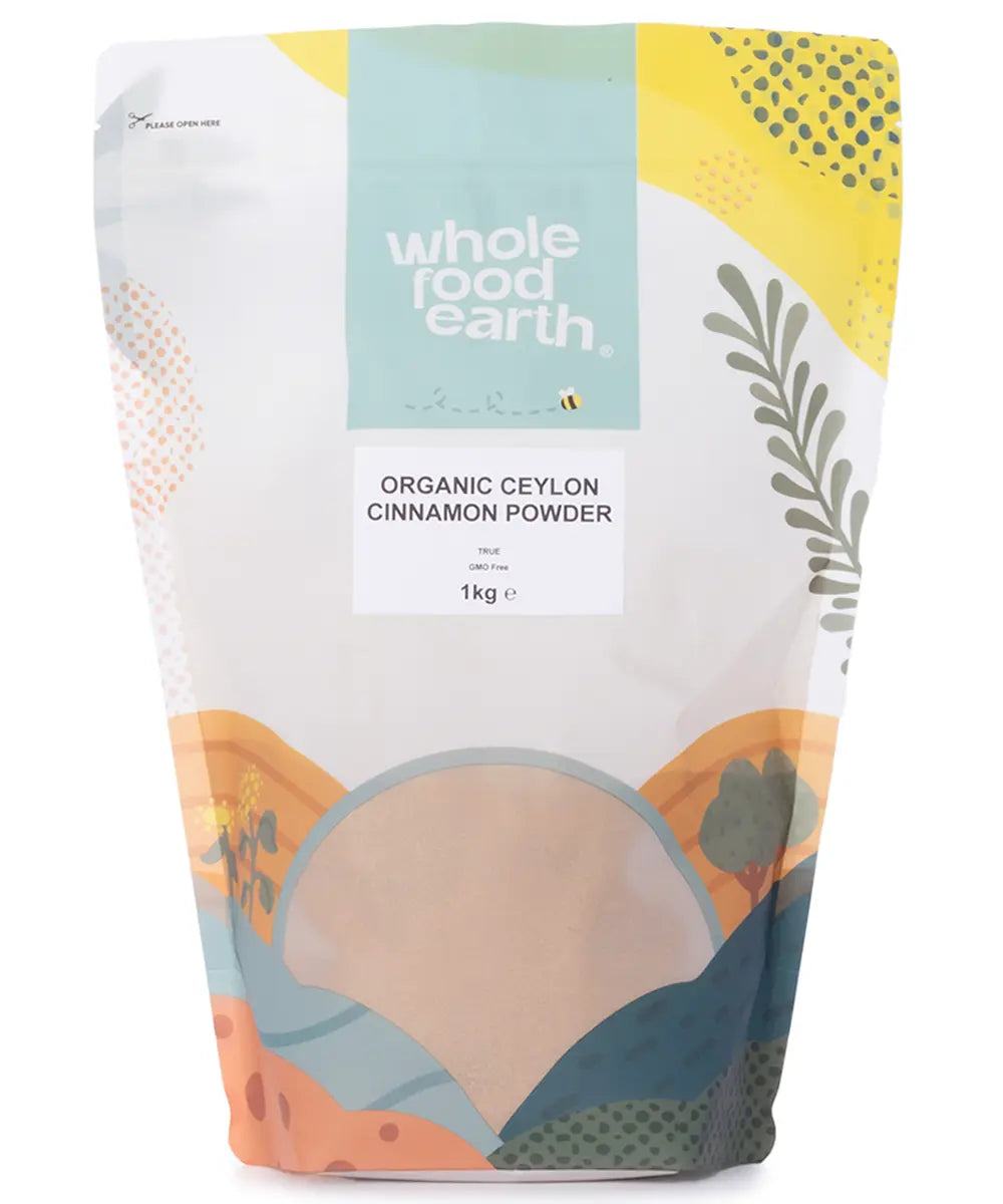 Organic Ceylon Cinnamon Powder from Whole Food Earth, showcasing a clear jar of aromatic cinnamon spice on a white background.